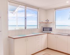 Mackerel-Islands-accommodation-beachfront-cabin-kitchen-1-slider-1.jpg